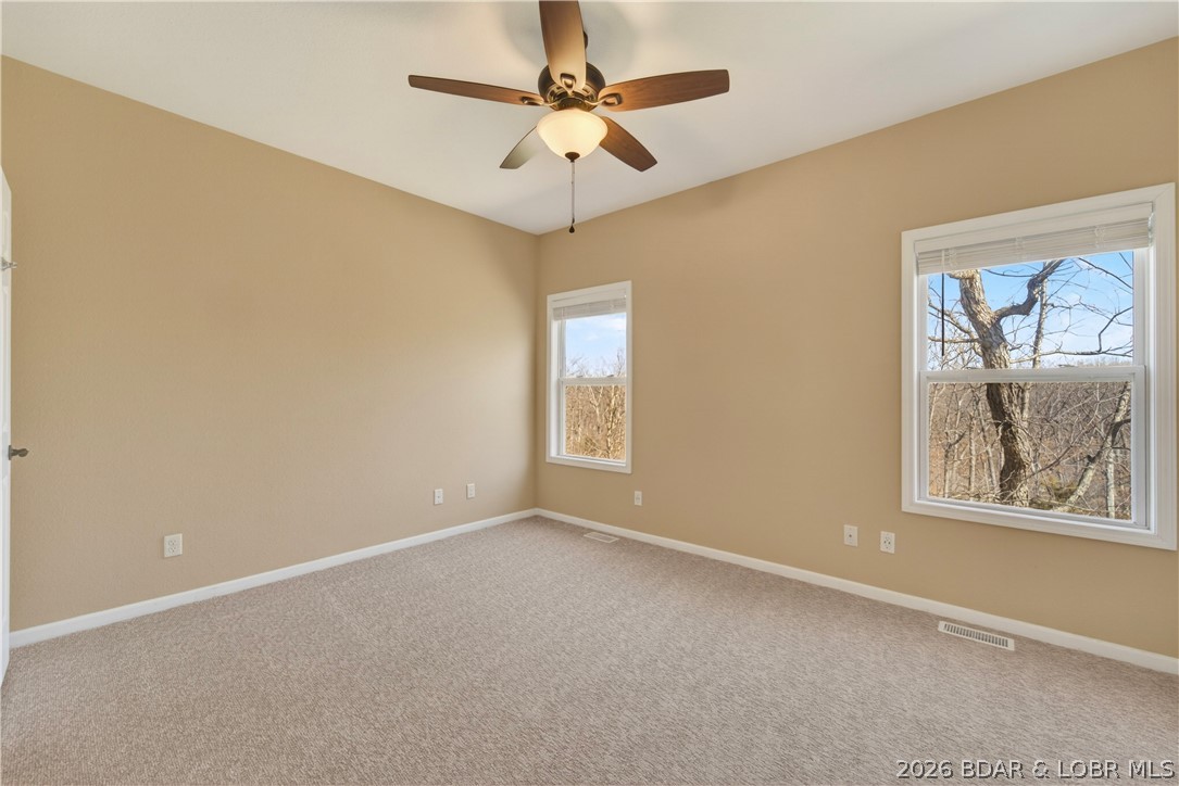 109 Reddington Road Four Seasons, MO 65049 - Photo 25 of 71 A private full bath located directly off the prima