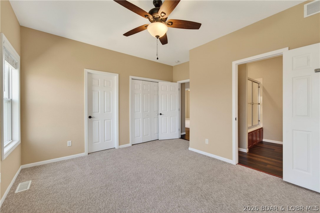 109 Reddington Road Four Seasons, MO 65049 - Photo 27 of 71 A private full bath located directly off the prima