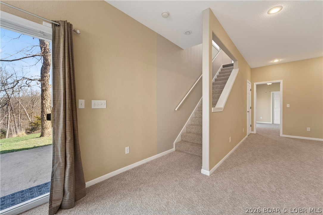 109 Reddington Road Four Seasons, MO 65049 - Photo 30 of 71 The spacious lower level family room provides an i