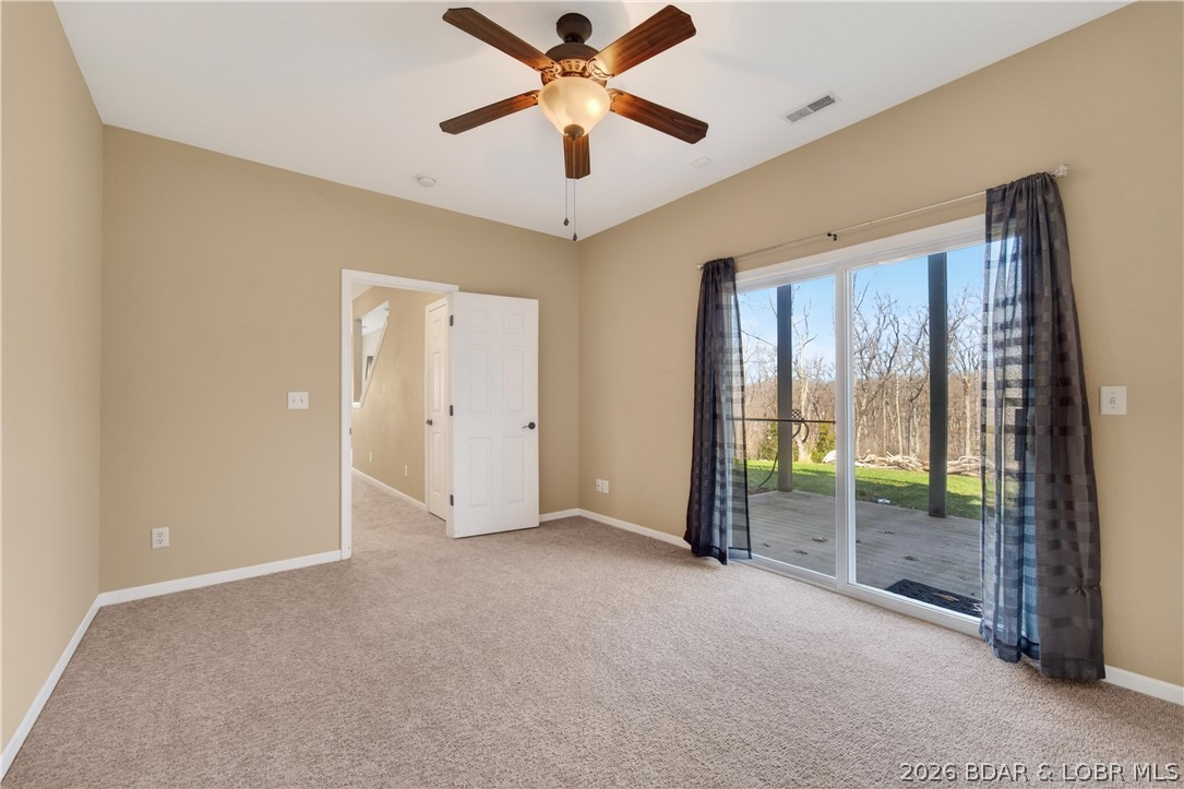 109 Reddington Road Four Seasons, MO 65049 - Photo 38 of 71 A private fourth bedroom located on the lower leve