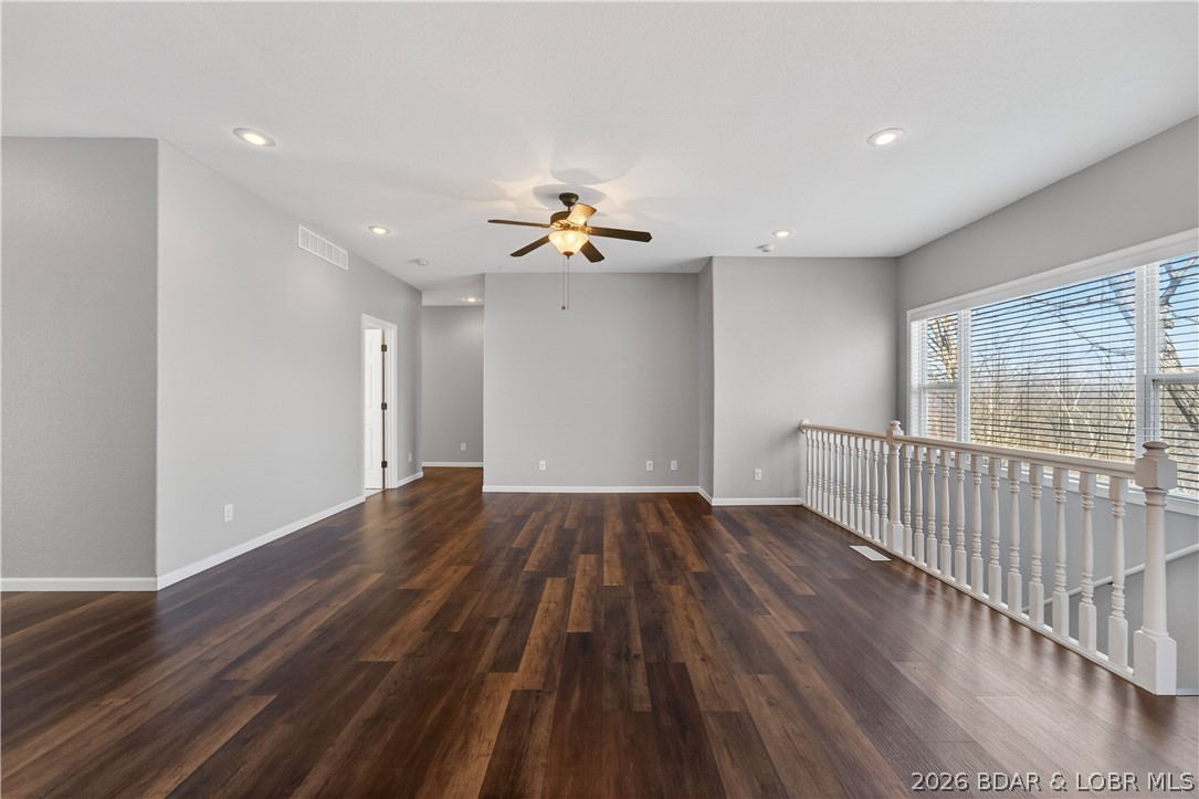 109 Reddington Road Four Seasons, MO 65049 - Photo 9 of 71 A spacious, open-concept living area flooded with