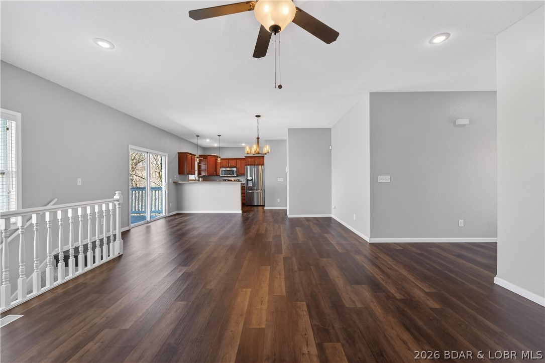 109 Reddington Road Four Seasons, MO 65049 - Photo 10 of 71 A spacious, open-concept living area flooded with