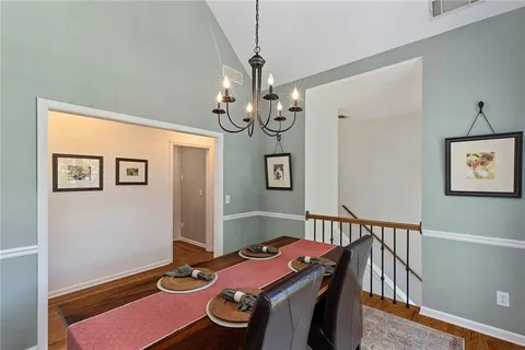 a kitchen with stainless steel appliances a refrigerator stove microwave and cabinets