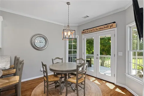 a kitchen with stainless steel appliances granite countertop a refrigerator sink and stove