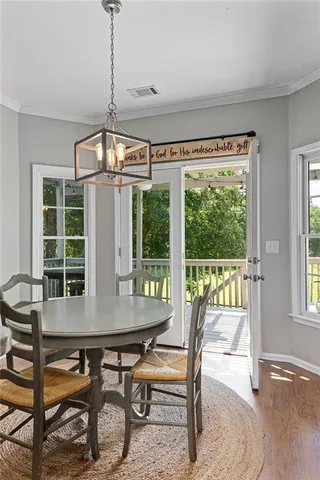 a living room with furniture a rug and a fireplace