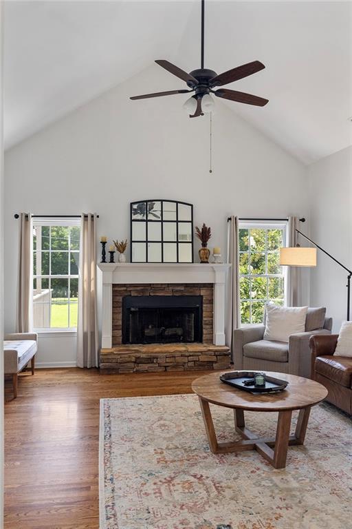 915 Taylor Parkway Suwanee, GA 30024 - Photo 26 of 61 a living room with furniture and a fireplace