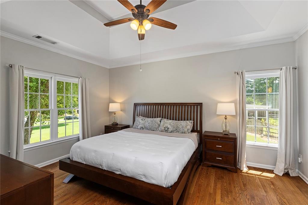 915 Taylor Parkway Suwanee, GA 30024 - Photo 28 of 61 a bedroom with a bed and a window