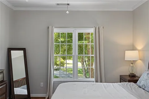 a bathroom with a double vanity sink and mirror