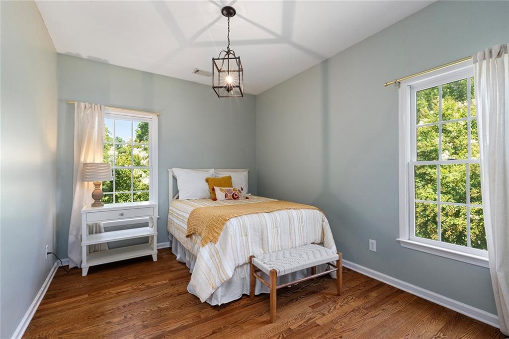 915 Taylor Parkway Suwanee, GA 30024 - Photo 38 of 61 a bedroom with a bed and a window