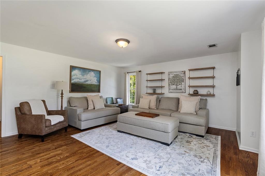 915 Taylor Parkway Suwanee, GA 30024 - Photo 44 of 61 a living room with furniture and a couch