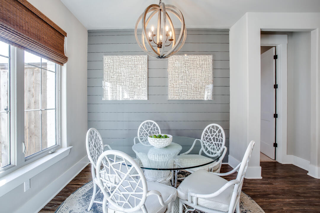 4301 138th Street Lubbock, TX 79423 - Photo 16 of 41 a view of a dining room with furniture window and wooden floor