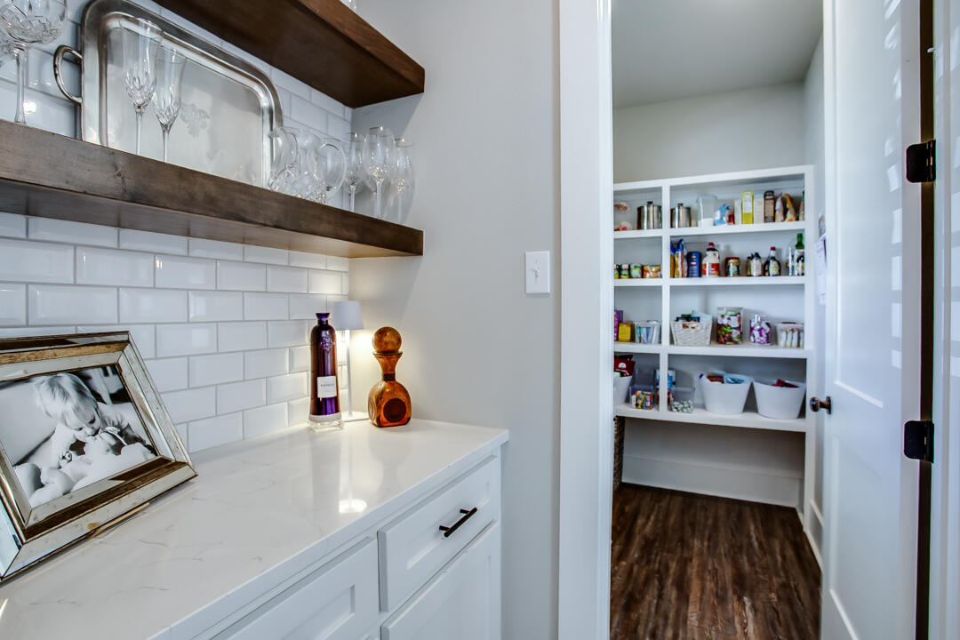 4301 138th Street Lubbock, TX 79423 - Photo 19 of 41 a kitchen with a cabinets and a stove