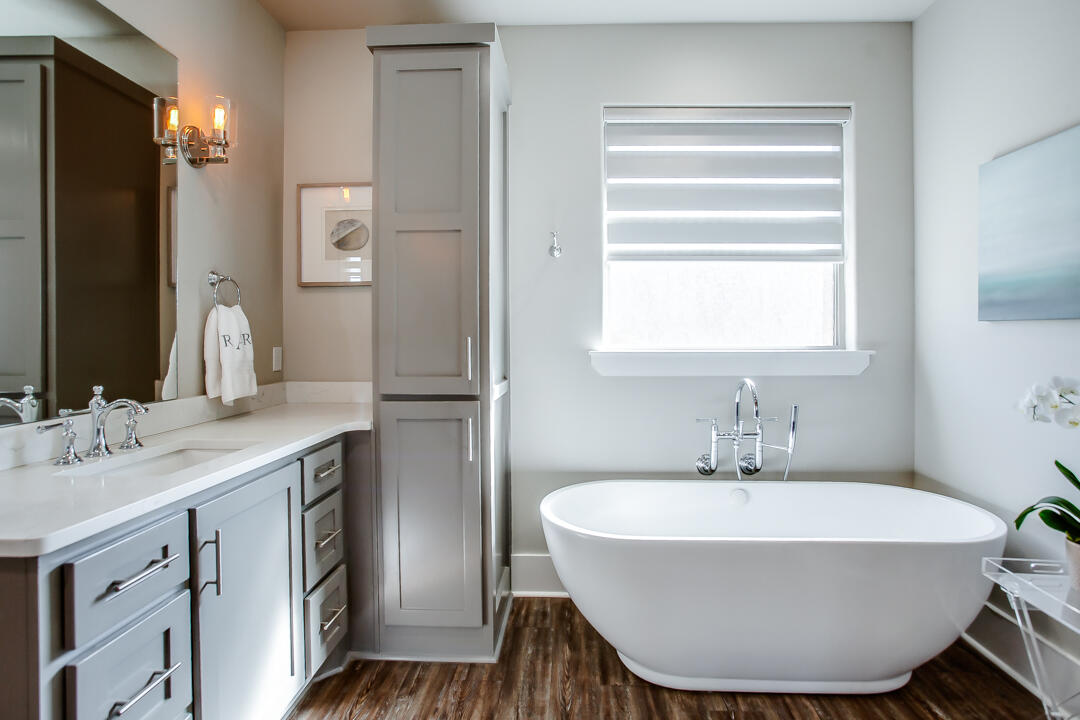 4301 138th Street Lubbock, TX 79423 - Photo 22 of 41 a bathroom with a sink and a mirror