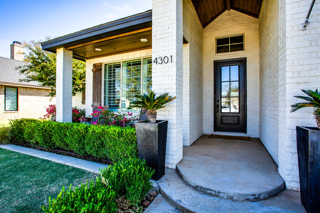 4301 138th Street Lubbock, TX 79423 - Photo 3 of 41 a view of a entryway in front of house