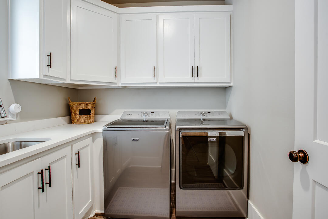 4301 138th Street Lubbock, TX 79423 - Photo 35 of 41 a utility room with dryer and washer