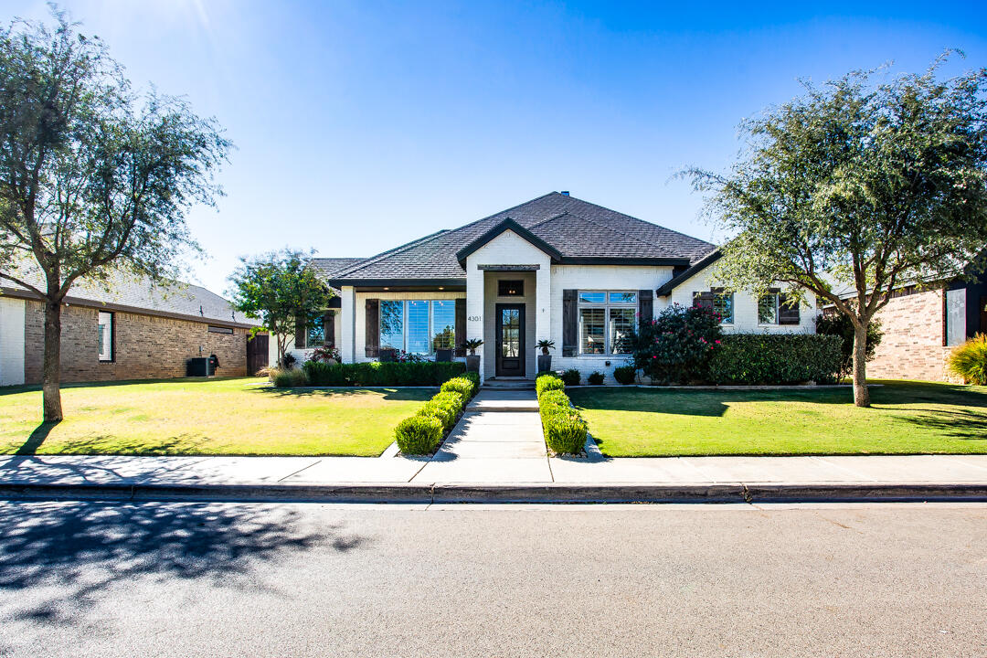 4301 138th Street Lubbock, TX 79423 - Photo 40 of 41 a house with swimming pool in front of it