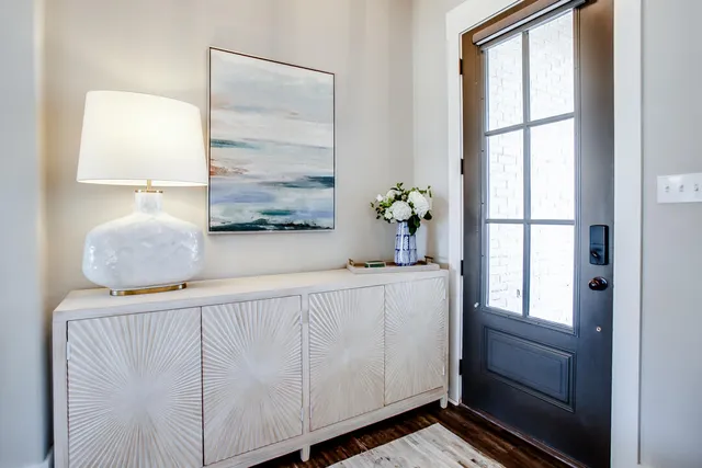 a bath room with a bed and a window