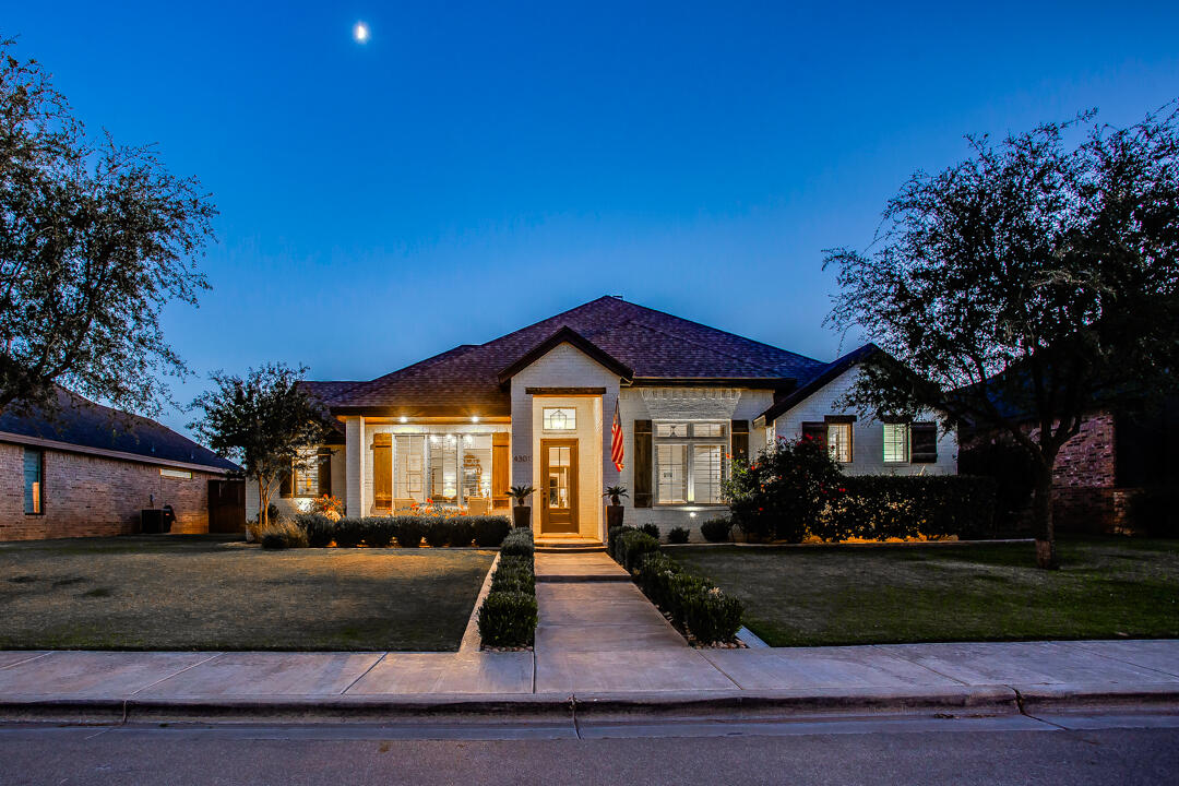4301 138th Street Lubbock, TX 79423 - Photo 41 of 41 a front view of a house with a yard