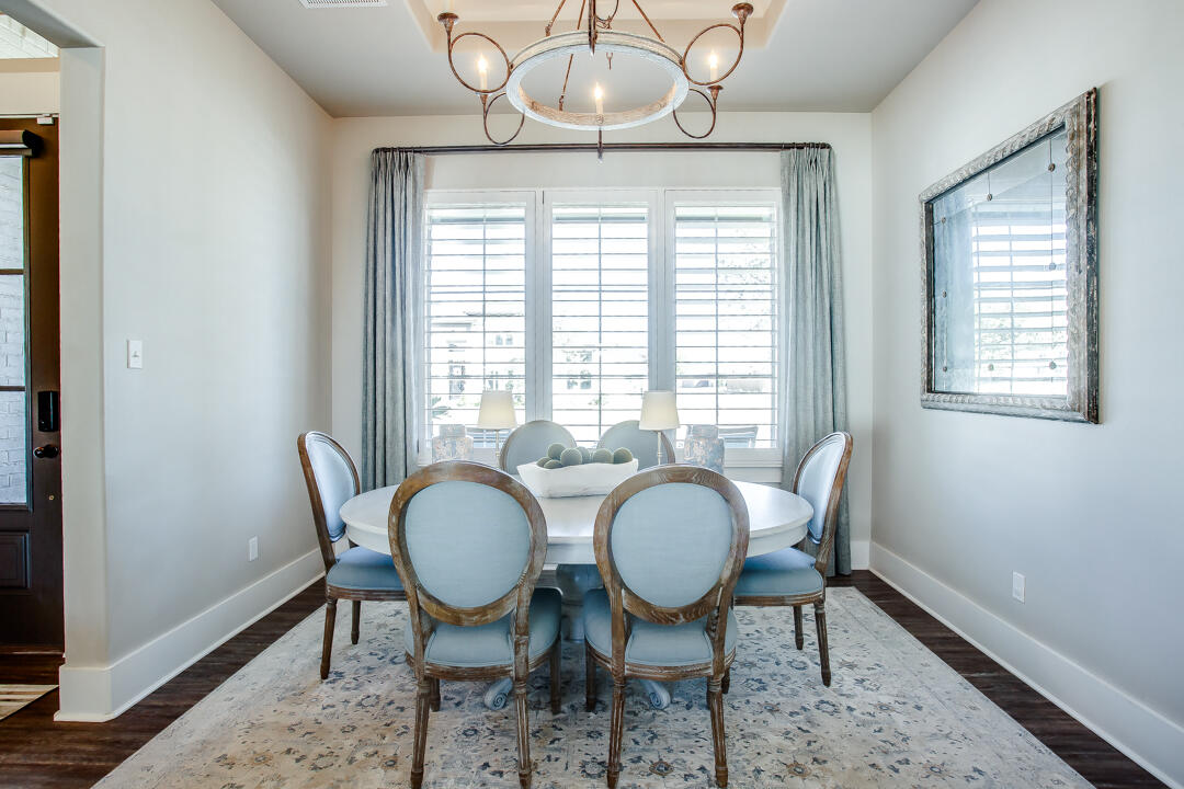 4301 138th Street Lubbock, TX 79423 - Photo 5 of 41 a view of a dining room with furniture window and wooden floor