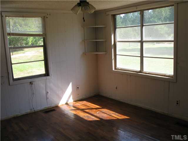 1585 Lettuce Hall Road Spring Hope, NC 27882 - Photo 4 of 11 an empty room with a window