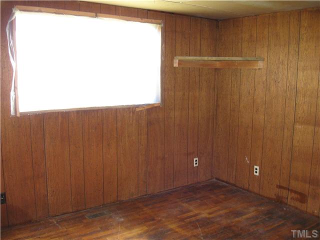 1585 Lettuce Hall Road Spring Hope, NC 27882 - Photo 7 of 11 a view of an empty room