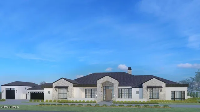 a front view of a house with a garden