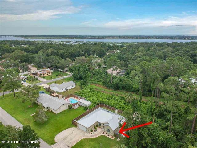 609 Queen Road St. Augustine, FL 32086 - Photo 27 of 35 an aerial view of residential houses with outdoor space and trees