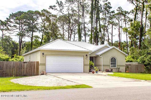 609 Queen Road St. Augustine, FL 32086 - Photo 28 of 35 a house with a outdoor space