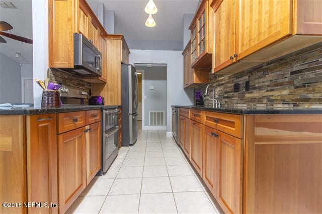 609 Queen Road St. Augustine, FL 32086 - Photo 30 of 35 a view of a kitchen from a balcony