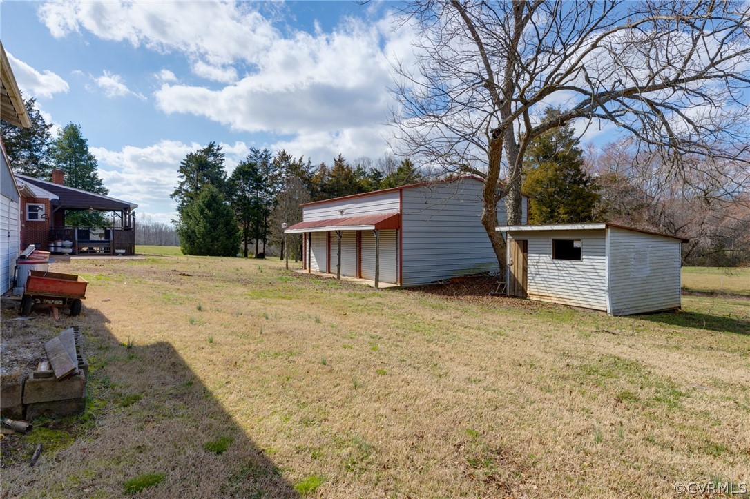 1037 Broad St Road Manakin-Sabot, VA 23103 - Photo 15 of 50 a view of a house with a yard
