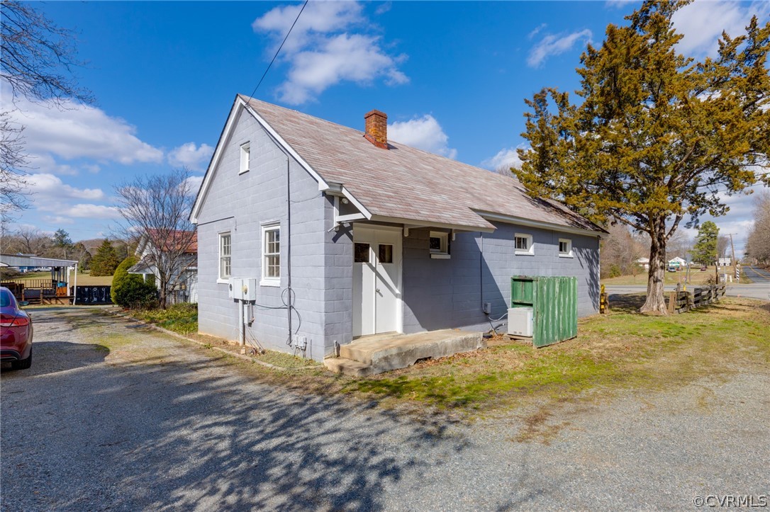1037 Broad St Road Manakin-Sabot, VA 23103 - Photo 16 of 50 a view of a house with a yard