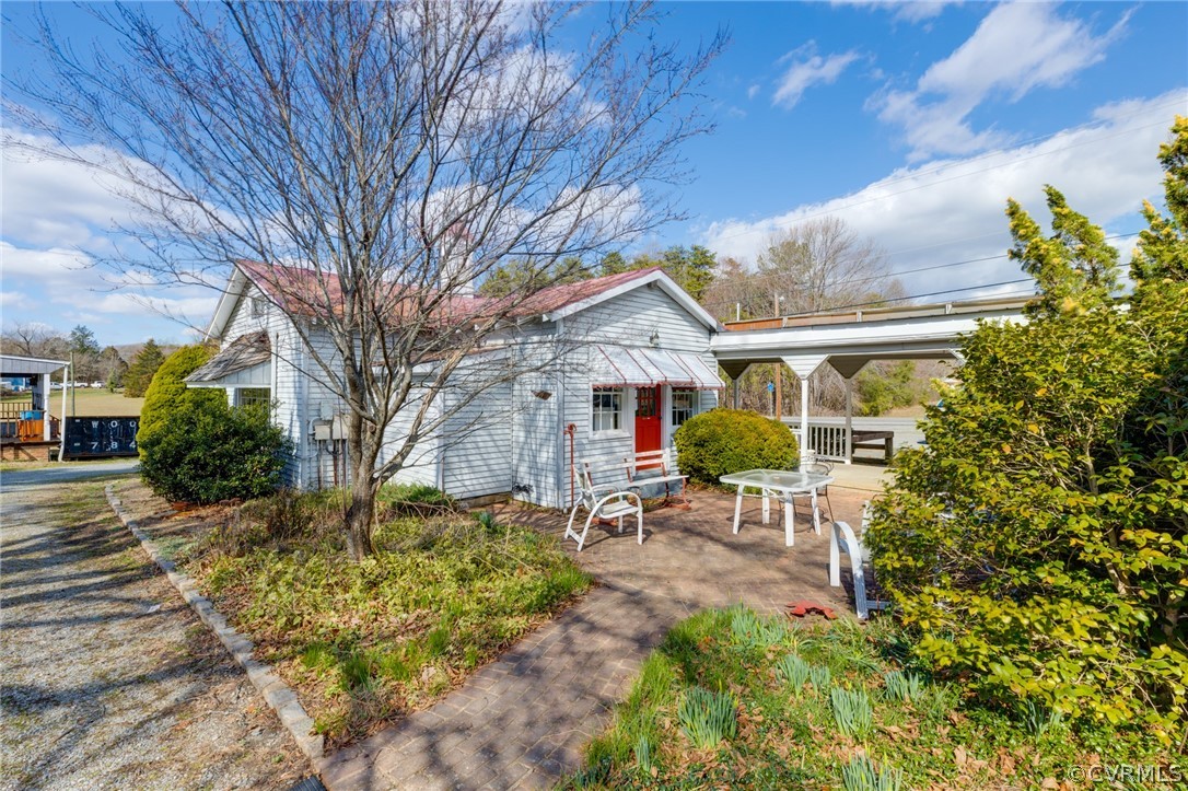 1037 Broad St Road Manakin-Sabot, VA 23103 - Photo 17 of 50 a view of a house with backyard and sitting area