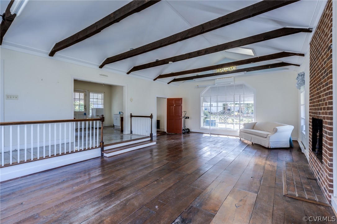 1037 Broad St Road Manakin-Sabot, VA 23103 - Photo 31 of 50 a view of a livingroom with wooden floor and a window