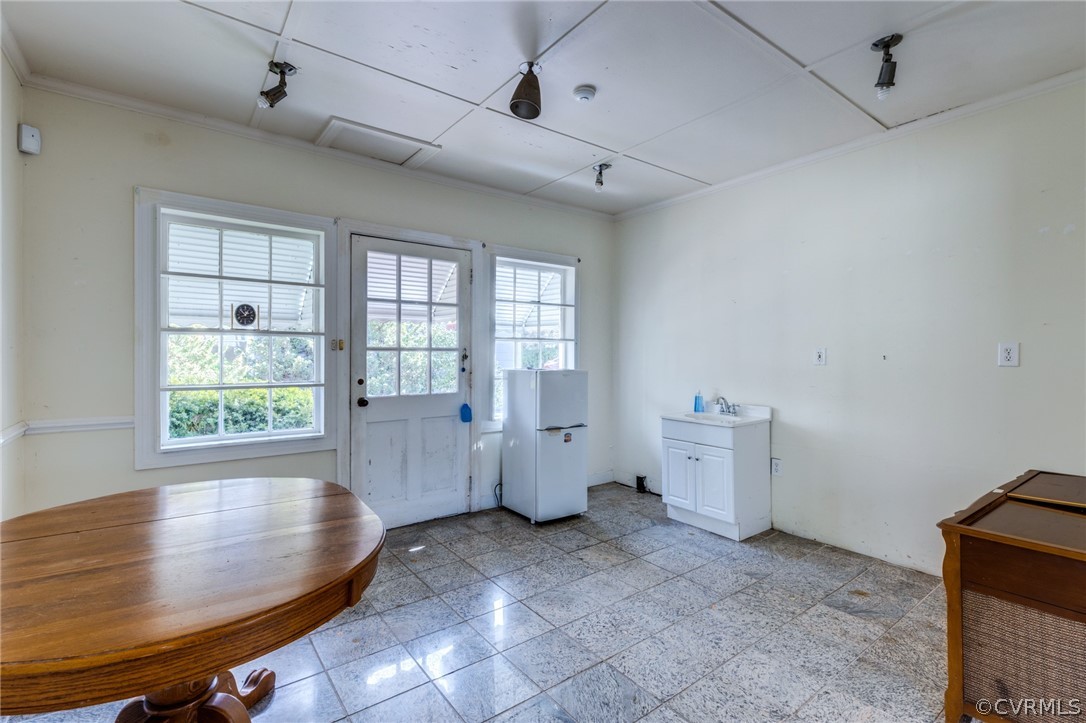 1037 Broad St Road Manakin-Sabot, VA 23103 - Photo 32 of 50 a room with window and chandelier