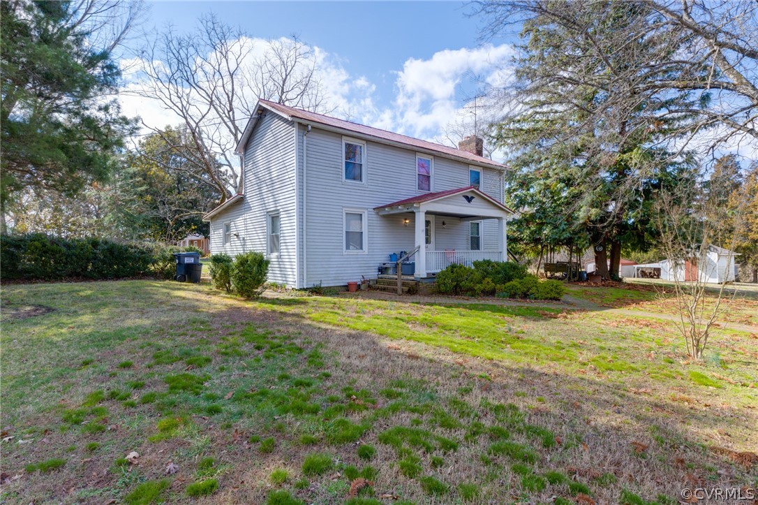1037 Broad St Road Manakin-Sabot, VA 23103 - Photo 4 of 50 a view of a house with backyard and garden