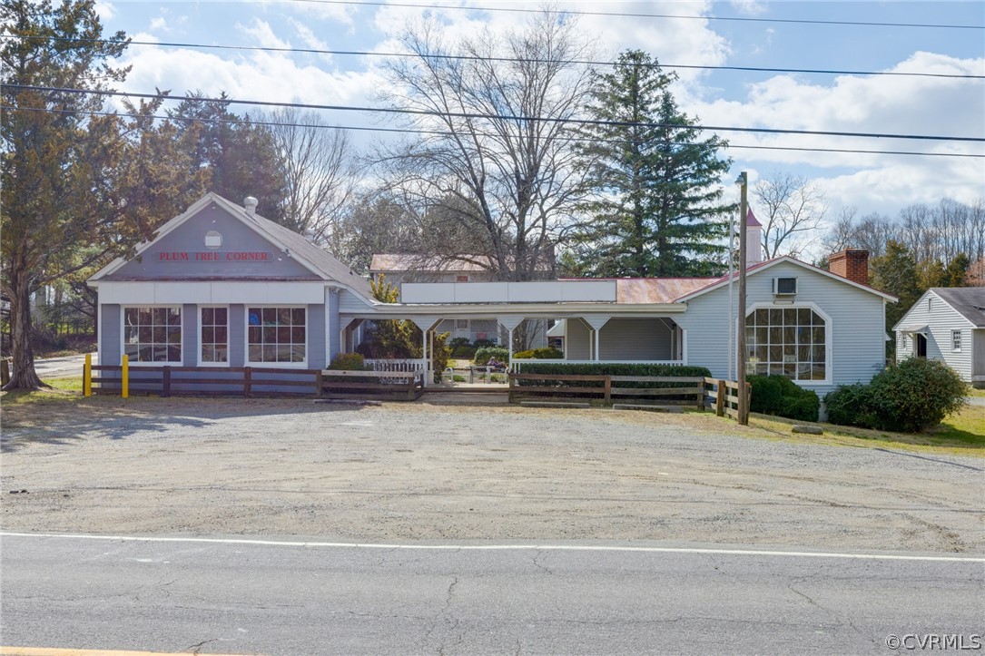 1037 Broad St Road Manakin-Sabot, VA 23103 - Photo 45 of 50 a front view of a house with yard porch and glass doors
