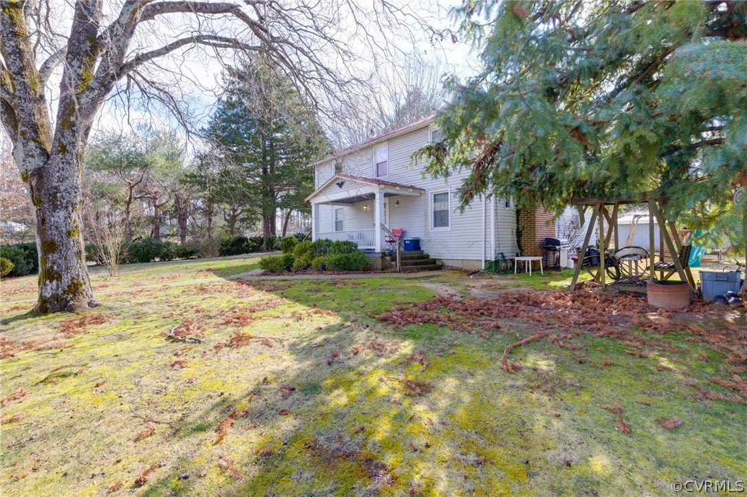 1037 Broad St Road Manakin-Sabot, VA 23103 - Photo 6 of 50 a view of a yard in front of house