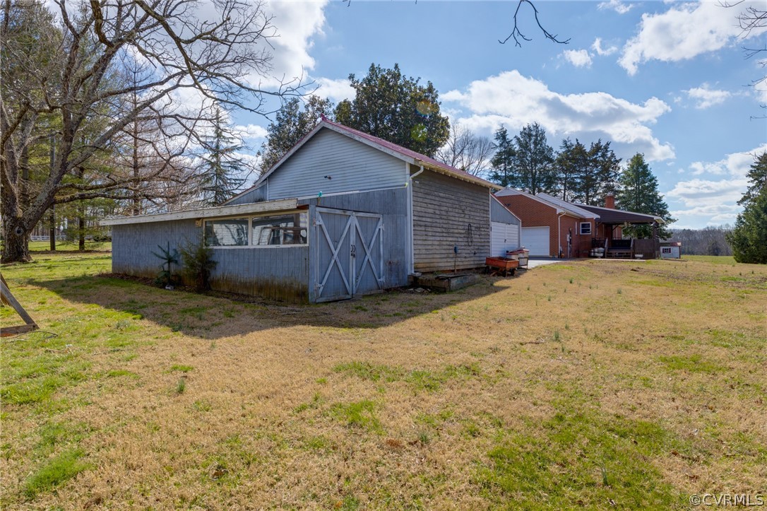 1037 Broad St Road Manakin-Sabot, VA 23103 - Photo 7 of 50 a view of a house with a yard