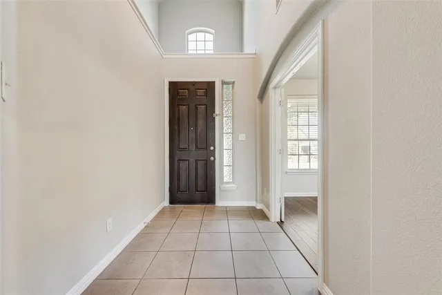 a view of an entryway and a hallway