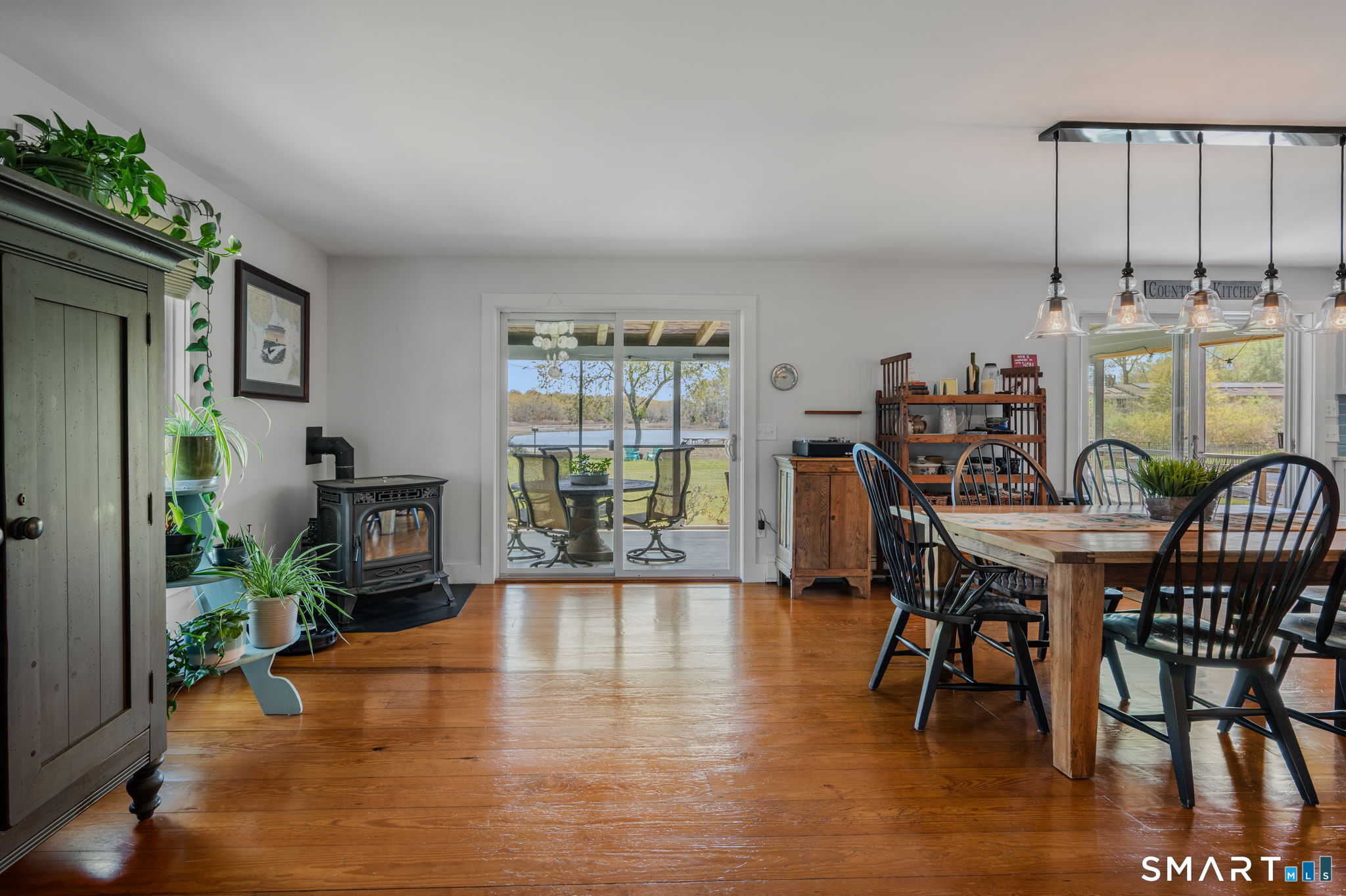 21 Hefflon Farm Road Old Lyme, CT 06371 - Photo 12 of 40 Sliding glass doors open to screen porch