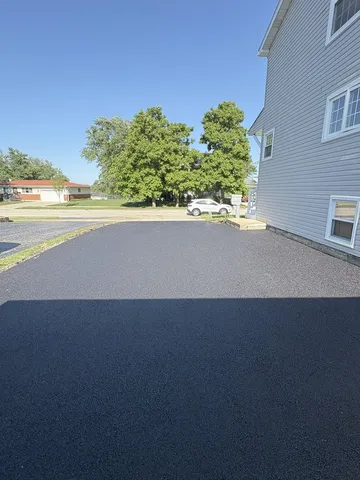a view of a house with a street