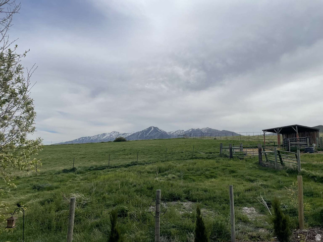 7030 West 2100 North Mendon, UT 84325 - Photo 17 of 67 Expansive green pastures with distant snow-capped mountains