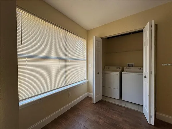 a view of a room with washer and dryer
