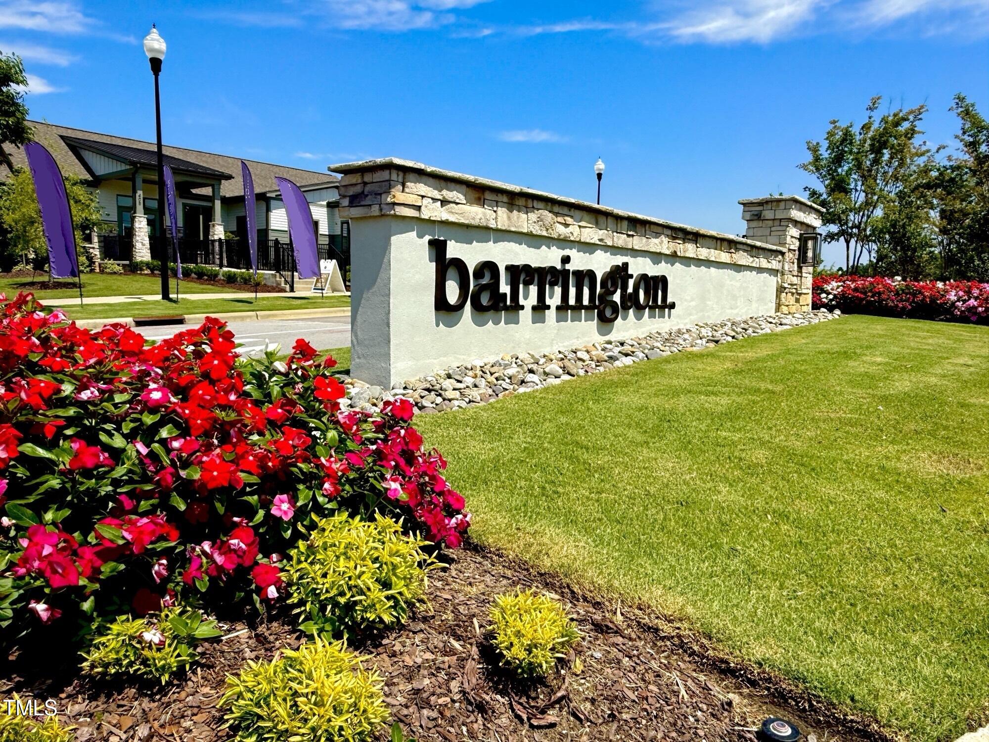 520 Eversden Drive Zebulon, NC 27597 - Photo 18 of 24 a view of a house with a big yard and potted plants