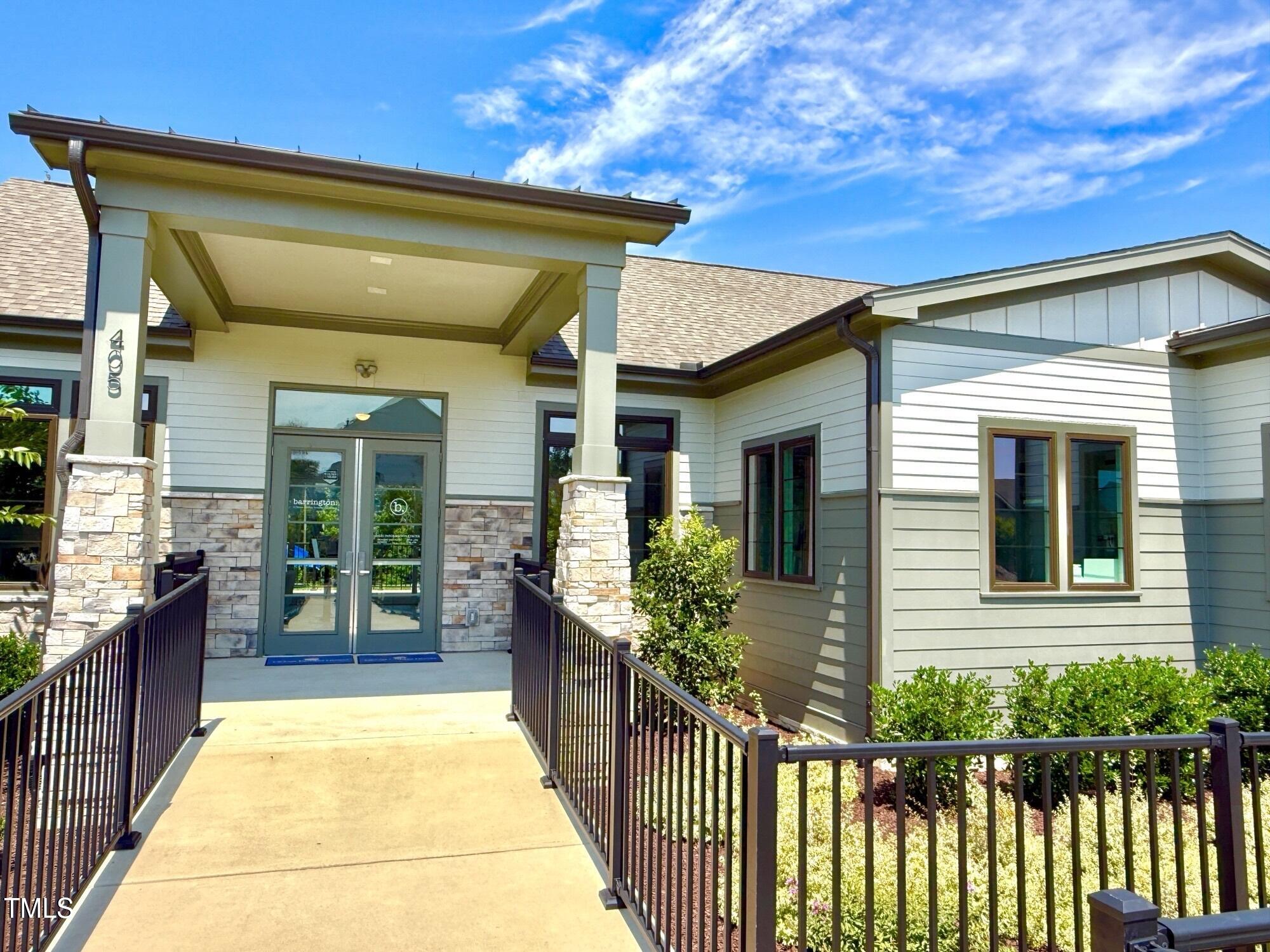 520 Eversden Drive Zebulon, NC 27597 - Photo 20 of 24 a view of a house with large windows