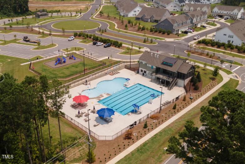 520 Eversden Drive Zebulon, NC 27597 - Photo 21 of 24 an aerial view of a house with a swimming pool