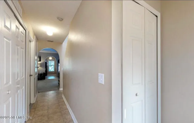 a view of a hallway with kids room