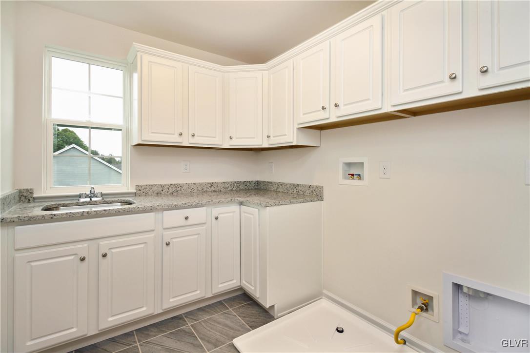 5850 Saucon Ridge Road Coopersburg, PA 18036 - Photo 30 of 32 Upstairs laundry- Photos shown are of a similar mo