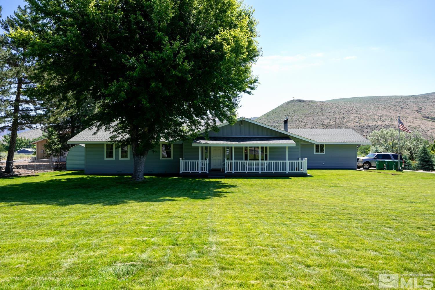 270 Kitts Way Reno, NV 89521 - Photo 1 of 16 a front view of a house with a garden