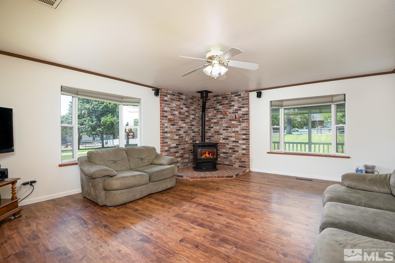 270 Kitts Way Reno, NV 89521 - Photo 7 of 16 a living room with furniture and a large window